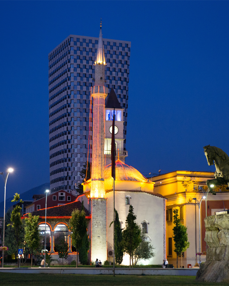 A view of the main Mosque and new office block from Skenderbeg Square in Tirana Albania